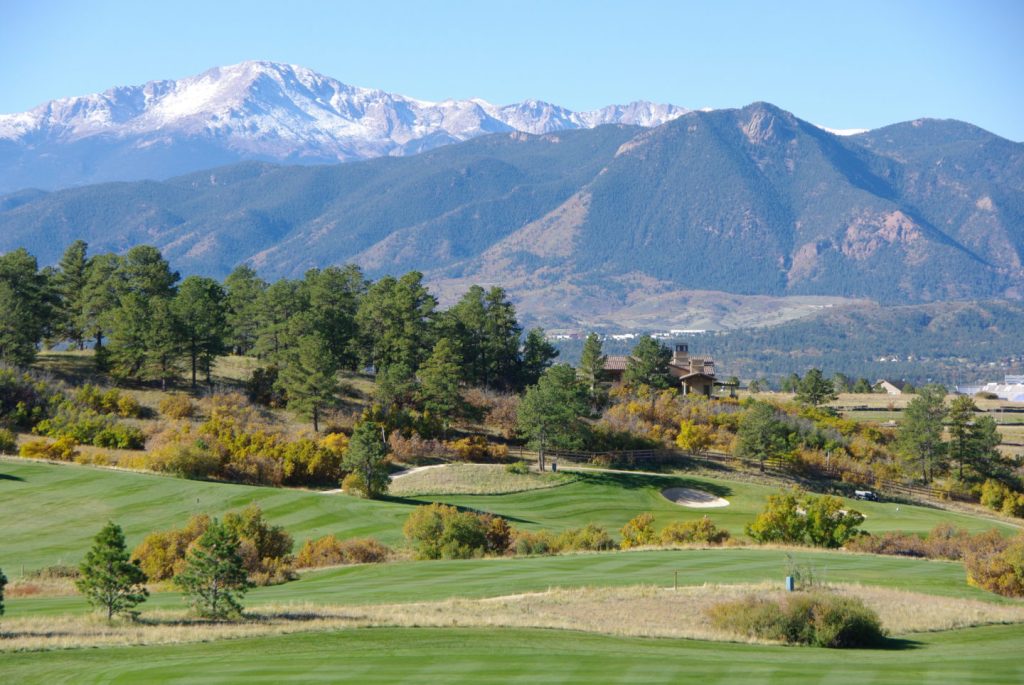 Mountains with golf course in foreground